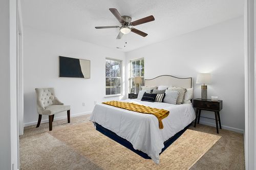 Loloi Magnolia Home by Joanna Gaines Junie Collection JUE-02 Oatmeal/Smoke 7'-10" x 10'-2", .38" Pile Height, Area Rug in White and Yellow Modern Bedroom