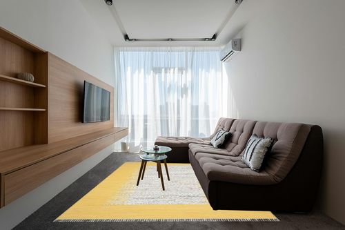 SAFAVIEH Montauk Collection Area Rug - 8' x 10', Ivory & Yellow, Handmade Stripe Fringe Cotton, Ideal for High Traffic Areas in Living Room, Bedroom (MTK711Q) in Grey Living Room with Brown Couch