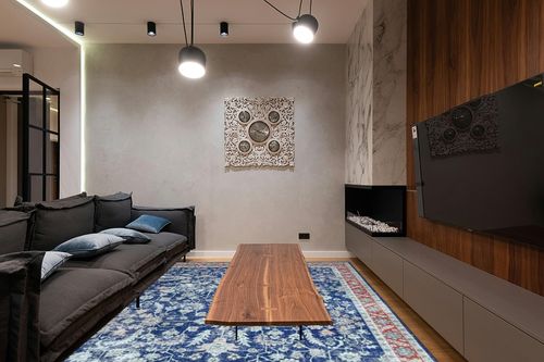GARVEE Large 9x12 Area Rug for Living Room Vintage Persian RugDistressed Floral Print Carpet for Bedroom Extra Large Dining Room Throw Rugs Non Slip Home Decor Rug for Harwood Floor Dorm Office, Blue in Dark Wood Living Room with Black Couch