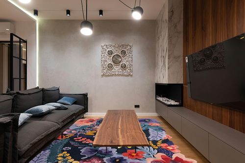 Restoration and Renovation Handmade Flower Multicoloured Irregular Area Rug 100% Imported Blended Wool Floral Area Rug (Navy, 9x6 ft) in Dark Wood Living Room with Black Couch