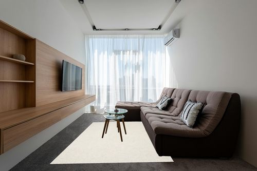 SAFAVIEH Popcorn Shag Collection Area Rug - 6' x 9', Ivory, Handmade, 1.8-inch Thick Ideal for High Traffic Areas in Living Room, Bedroom (SG267A) in Grey Living Room with Brown Couch