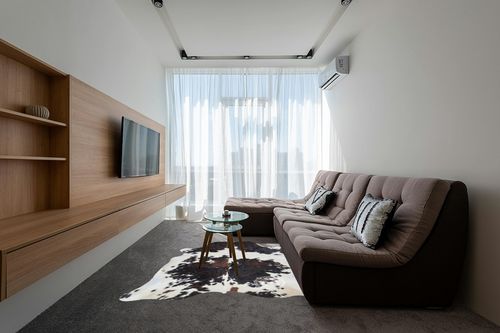 Sunshine Cowhides Genuine Tricolor Cow Skin Leather Cowhide Rug - Luxurious Cow Rug for Bedroom, Living Room, and Home Decor Enthusiasts - Masterpiece of Style and Functionality - XL 6x7-8ft in Grey Living Room with Brown Couch