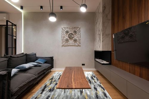 Abani Porto PRT140C Contemporary Grey and Yellow Abstract Area Rug 6' x 9' in Dark Wood Living Room with Black Couch