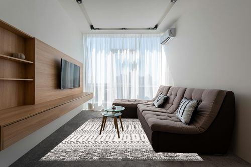 Art&Tuft 8x10 Area Rug, Super Soft Ultra-Thin Moroccan Washable Rug, Anti-Slip Backing Rugs for Living Room, Foldable Geometric Machine Washable Area Rug(8'x10', Black) in Grey Living Room with Brown Couch