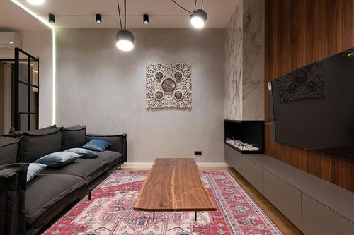 SAFAVIEH Tucson Collection Area Rug - 9' x 12', Red & Pink, Persian Design, Non-Shedding Machine Washable & Slip Resistant Ideal for High Traffic Areas in Living Room, Bedroom (TSN139R) in Dark Wood Living Room with Black Couch