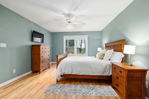 Wonnitar Moroccan Washable Runner Rug in Teal and Orange Wood Bedroom