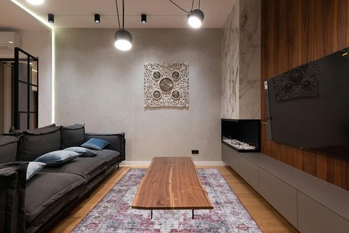 SAFAVIEH Tucson Collection Area Rug - 6' x 9', Beige Green & Rust, Persian Medallion Design, Machine Washable Ideal for High Traffic Areas in Living Room, Bedroom, Dining (TSN105C-6) in Dark Wood Living Room with Black Couch