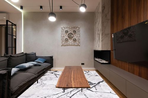 SAFAVIEH Amelia Collection Area Rug - 8' x 10', Grey & Black, Modern Abstract Design, Non-Shedding & Easy Care, Ideal for High Traffic Areas in Living Room, Bedroom (ALA293K) in Dark Wood Living Room with Black Couch