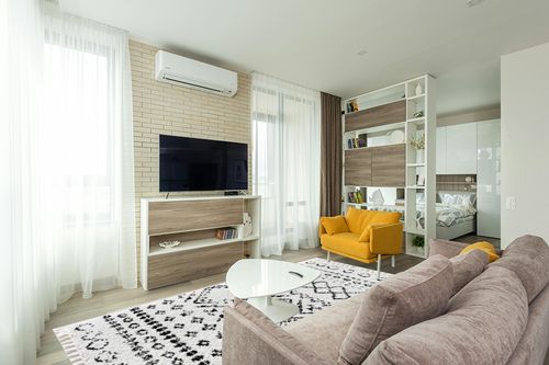 CosmoLiving by Cosmopolitan Wisp Area Rug, 8'0" x 10'0", Whisper White in Light Modern Living Room with TV