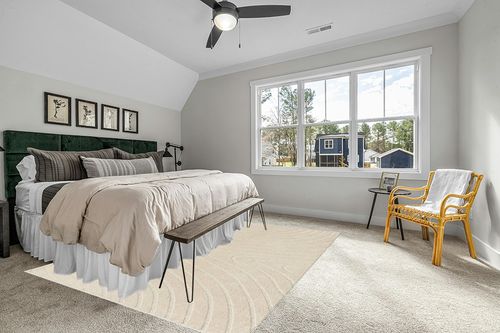LUXE WEAVERS Modern Geometric Wave Cream 8x10 Area Rug in Grey Traditional Bedroom with King Bed