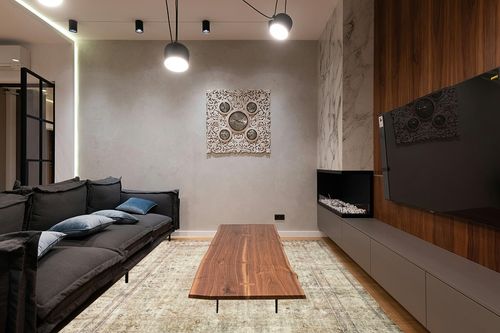 Loloi II Margot Collection MAT-01 Antique/Sage 7'-6" x 9'-6" Area Rug feat. CloudPile in Dark Wood Living Room with Black Couch