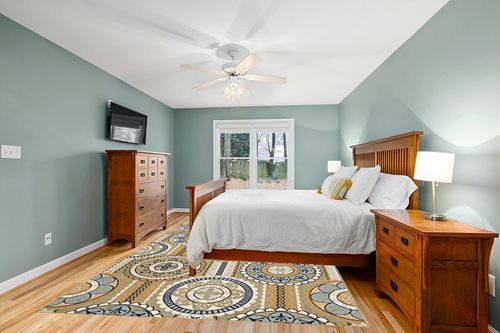 Nourison Caribbean Indoor Outdoor Area Rug, 7'10" x 10'6", Yellow in Teal and Orange Wood Bedroom