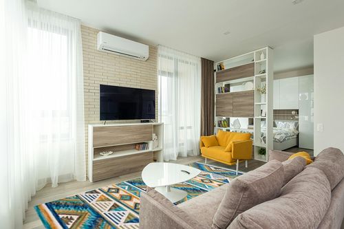 SAFAVIEH Aspen Collection Area Rug - 8' x 10', Blue & Yellow, Handmade Boho Wool, Ideal for High Traffic Areas in Living Room, Bedroom (APN352M) in Light Modern Living Room with TV