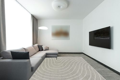 LUXE WEAVERS Modern Geometric Wave Gray 8x10 Area Rug in Modern Living Room with Grey Couch