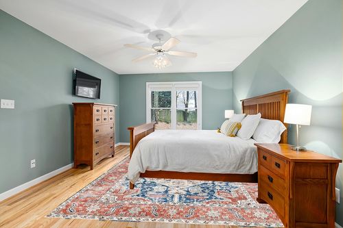 VK Living Washable Rug, in Teal and Orange Wood Bedroom