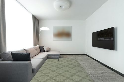 Garland Rug Quatro 6 ft. x 9 ft. Area Rug Sage in Modern Living Room with Grey Couch
