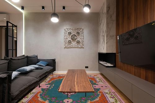 SAFAVIEH Bellagio Collection Area Rug - 8' x 10', Blue & Pink, Handmade Medallion Wool, Ideal for High Traffic Areas in Living Room, Bedroom (BLG535M) in Dark Wood Living Room with Black Couch