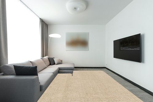 SAFAVIEH Natural Fiber Collection Area Rug - 9' x 12', Natural & Beige, Border Basketweave Seagrass Design, Easy Care, Ideal for High Traffic Areas in Living Room, Bedroom (NF114A) in Modern Living Room with Grey Couch