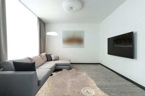 Sunshine Cowhides Genuine Metallic Gold on Off White Cowhide Rug - Luxurious Cow Rug for Bedroom, Living Room, and Home Decor Enthusiasts - Masterpiece of Style and Functionality - 6x8ft (180x240cm) in Modern Living Room with Grey Couch