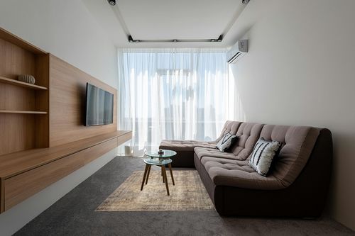 Amber Lewis x Loloi Morgan Collection MOG-01 Sunset / Ink 5'-0" x 7'-0" Area Rug feat. CloudPile in Grey Living Room with Brown Couch