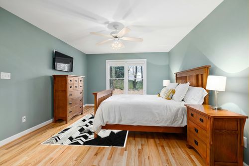 Handmade Black and White Cowhide Patchwork Rug - Black and White with Grayish Stripes Herringbone Chevron Patchwork Cowhide Rug 5 ft X 8 ft in Teal and Orange Wood Bedroom