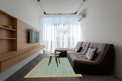 nuLOOM Eleonora Casual Jute Area Rug, 6x9, Green in Grey Living Room with Brown Couch