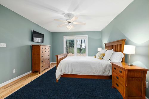 Everyday Shag Rug 10' x 14' in Teal and Orange Wood Bedroom