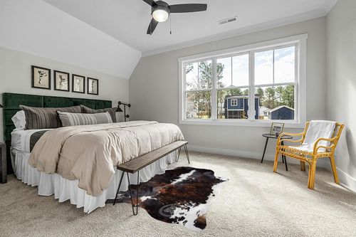 Sunshine Cowhides Genuine Brindle Dark Tricolor Cowhide Rug - Luxurious Cow Rug for Bedroom, Living Room, and Home Decor Enthusiasts - Masterpiece of Style and Functionality - 6x6-7ft (180x210cm) in Grey Traditional Bedroom with King Bed