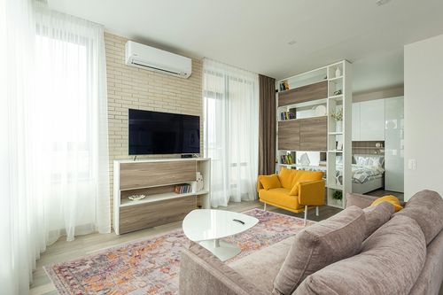 SAFAVIEH Madison Collection Area Rug - 8' x 10', Beige & Orange, Boho Chic Medallion Distressed Design, Non-Shedding & Easy Care, Ideal for High Traffic Areas in Living Room, Bedroom (MAD473E) in Light Modern Living Room with TV