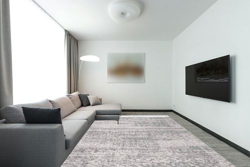 nuLOOM Lira Textured Geometric Tassel Area Rug, 9x12, Grey in Modern Living Room with Grey Couch