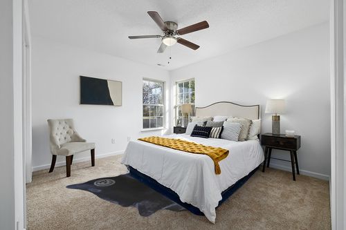 Sunshine Cowhides Genuine Black Cowhide Rug - Luxurious Cow Rug for Bedroom, Living Room, and Home Decor Enthusiasts - Masterpiece of Style and Functionality - 6x6-7ft (180x220cm) in White and Yellow Modern Bedroom