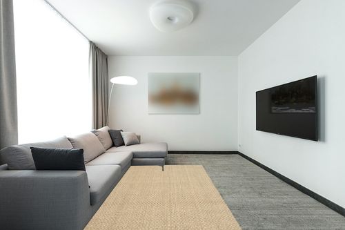 SAFAVIEH Natural Fiber Collection Area Rug - 5' x 8', Natural & Blue, Border Basketweave Seagrass Design, Easy Care, Ideal for High Traffic Areas in Living Room, Bedroom (NF114E) in Modern Living Room with Grey Couch