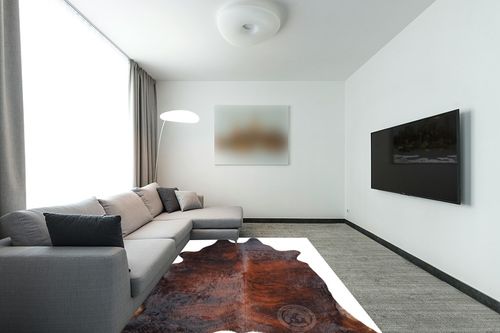 Genuine Brindle Dark Reddish Cowhide Rug XL Size 6 x 7-8 ft. 180 x 240 cm in Modern Living Room with Grey Couch