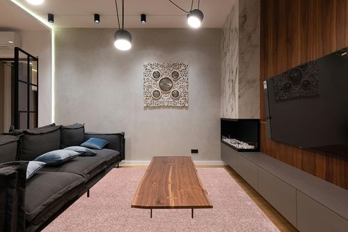 JONATHAN Y SEU100P-9 Haze Solid Low-Pile Indoor Area-Rug, Coastal, Bohemian, Minimalist Easy-Washing,Bedroom,Kitchen,Living Room,Non Shedding, Pink, 9 X 12 in Dark Wood Living Room with Black Couch