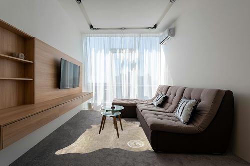 Sunshine Cowhides Genuine Metallic Gold on Off White Cowhide Rug - Luxurious Cow Rug for Bedroom, Living Room, and Home Decor Enthusiasts - Masterpiece of Style and Functionality - 6x8ft (180x240cm) in Grey Living Room with Brown Couch