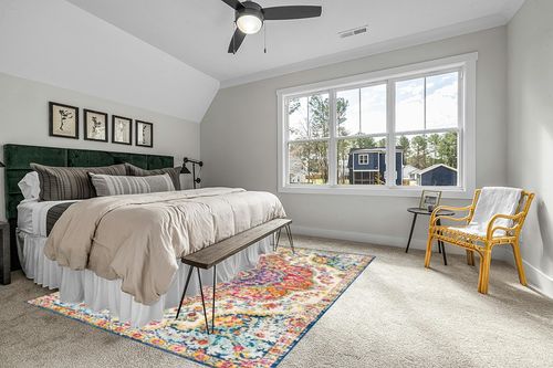 Orange Traditional Stain Resistant Living Room Area Rug in Grey Traditional Bedroom with King Bed