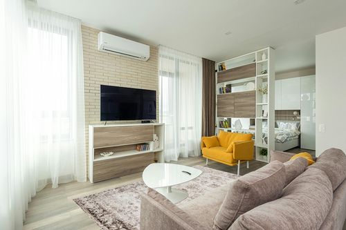 Unique Loom Sofia Collection Area Rug - Casino (5' 3" x 8' Rectangle, Beige/ Tan) in Light Modern Living Room with TV