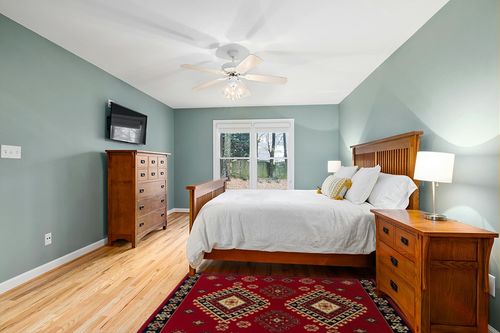 SUPERIOR Indoor Small Area Rug with Jute Backing, Bohemian Geometric Rugs for Home, Bedroom, Living Room, Kitchen, Entryway, Office, Southwestern Floor Decor, Santa Fe Collection, 4' x 6', Red in Teal and Orange Wood Bedroom