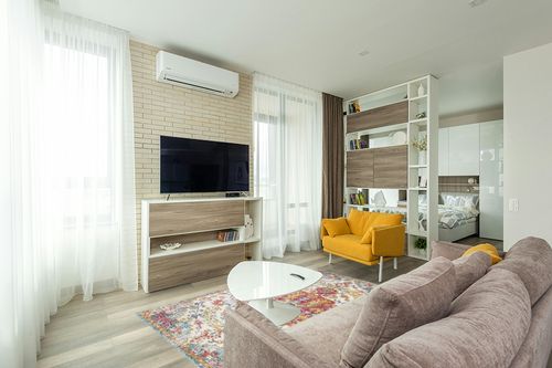 Artistic Weavers Odelia Vintage Bohemian Area Rug,5'3" x 7'3",Orange/Aqua in Light Modern Living Room with TV