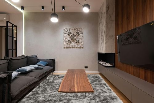 SAFAVIEH Ocean Shag Collection Area Rug - 8' x 10', Silver, Handmade Solid, 2.4-inch Thick Ideal for High Traffic Areas in Living Room, Bedroom (OCG101G) in Dark Wood Living Room with Black Couch