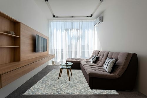 SAFAVIEH Abstract Collection Area Rug - 8' x 10', Blue & Grey, Handmade Wool, Ideal for High Traffic Areas in Living Room, Bedroom (ABT201A) in Grey Living Room with Brown Couch