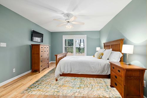 Mat The Basics Torrance Area Rug (9' x 12', Aqua/Orange) in Teal and Orange Wood Bedroom