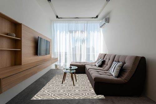 Nourison Jubilant Moroccan Trellis Grey Area Rug, (6' x 9') in Grey Living Room with Brown Couch
