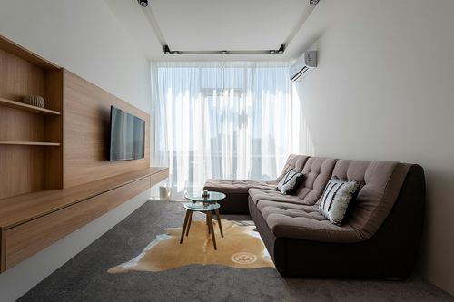 Genuine Palomino Beige and White Cowhide Rug 6 x 7-8 ft. 180 x 240 cm in Grey Living Room with Brown Couch