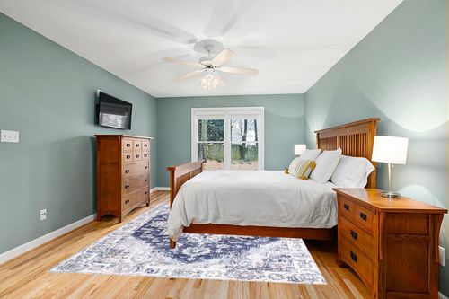 Auemtyn Washable Rug,8x10 Area Rug for Living Room, Rug with Anti-Slip Backing, Vintage Rug for Bedroom,Ultra-Thin Boho Farmhouse Rug for Home Decor(8'x10',Blue) in Teal and Orange Wood Bedroom