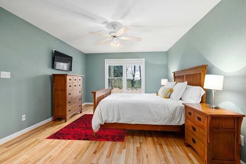 Antep Rugs Floral 5x7 Abstract Indoor Area Rug Siesta (Red Black, 5'3" x 7') in Teal and Orange Wood Bedroom