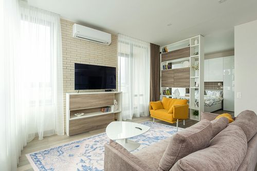 SAFAVIEH Micro-Loop Collection Area Rug - 8' x 10', Ivory & Blue, Handmade Shabby Chic Medallion Wool, Ideal for High Traffic Areas in Living Room, Bedroom (MLP503G) in Light Modern Living Room with TV