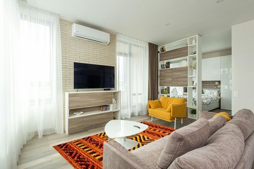 INDIA LIVING Indian Handmade Kilim Rug Moroccan Area Rug Washable Bedroom Rug Indoor Small Persian Living Room Office Carpet Decorative Rug, 5"x8", Orange in Light Modern Living Room with TV