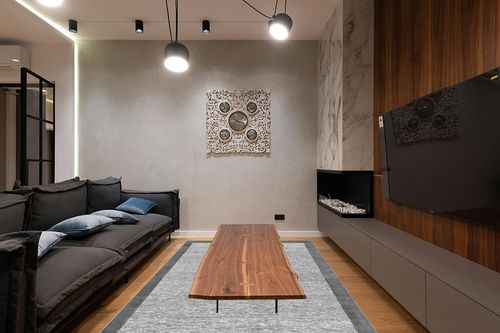 nuLOOM Marianne Handmade Wool Border Area Rug, 6' x 9', Grey in Dark Wood Living Room with Black Couch