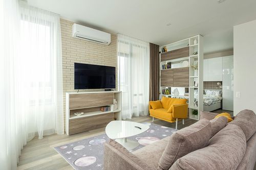 SAFAVIEH Carousel Kids Collection Area Rug - 5'3" x 7'6", Grey & Lavender, Non-Shedding & Easy Care, Ideal for High Traffic Areas for Boys & Girls in Playroom, Nursery, Bedroom (CRK103F) in Light Modern Living Room with TV